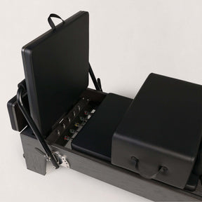 FOLD STUDIO Reformer machine showcasing premium hardwood frame and vegan-friendly upholstery