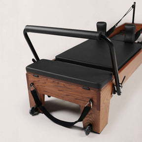 FOLD STUDIO Reformer showcasing premium hardwoods and vegan upholstery for stylish and functional workouts.
