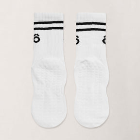 Crew Pilates Grip Socks and Resistance Band Bundle – Essentials, featuring white socks with black sporty stripes.