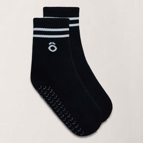 Crew Pilates Grip Socks and Resistance Band Bundle – Essentials featuring black striped grip socks.