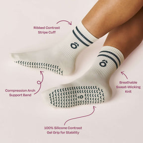 Everyday Crew Grip Socks - Forest Green showcasing ribbed contrast cuff and grip sole details.