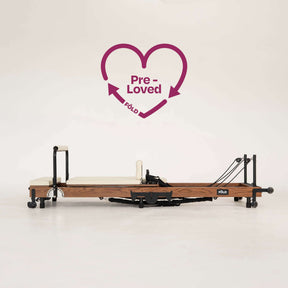 Pre-Loved Original FOLD Reformer - With Easi-Fold™ featuring a maple oak frame and vegan-friendly upholstery.