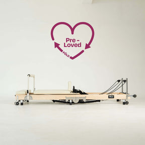 Pre-Loved Original FOLD Reformer - With Easi-Fold™ (Copy) on display with heart graphic