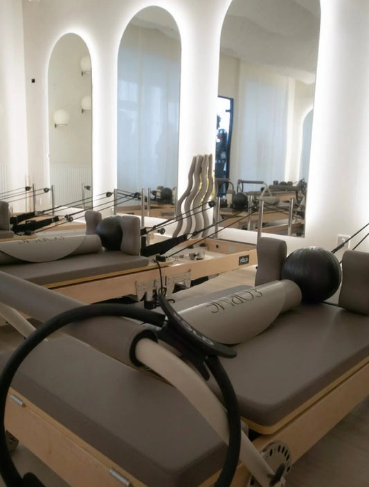 10 Best Reformer Pilates Classes in Manchester - interior of a modern reformer Pilates studio.