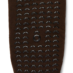 Brown sock with black textured pattern on a white background