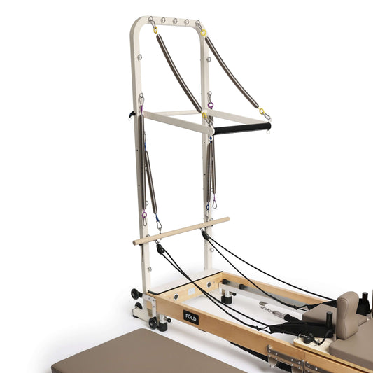 Original FOLD Reformer With TOWER showcasing its innovative design and Easi-Fold™ system for versatile movement.