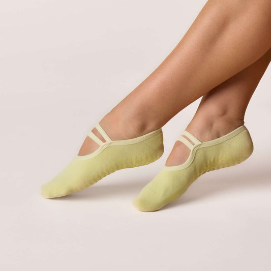 Ballet Grip Socks - Lime showcase featuring non-slip grip sole and soft elastic straps for studio workouts.