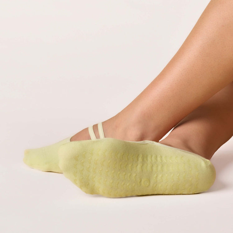 Ballet Grip Socks - Lime showing non-slip grip sole and elastic strap underfoot.
