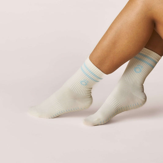Everyday Crew Grip Socks - Baby Blue displayed on feet, featuring soft cotton comfort and non-slip soles.