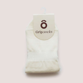 Everyday Crew Grip Socks - Butter Yellow displayed in a soft cotton design with a tag for grip socks.