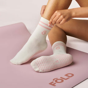 Everyday Crew Grip Socks - Rose worn on a yoga mat, showcasing soft cotton comfort and non-slip soles.