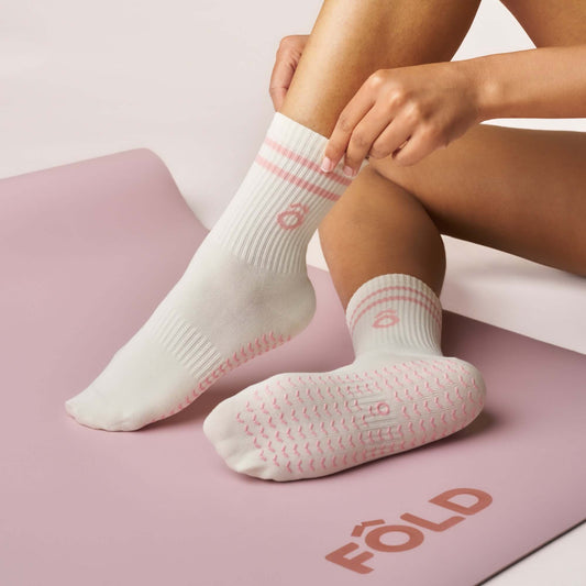 Everyday Crew Grip Socks - Rose worn on a yoga mat, showcasing soft cotton comfort and non-slip soles.