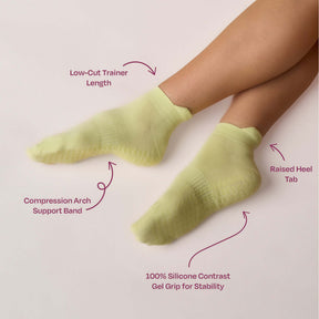 Pilates Low Rise Grip Socks - Lime showcasing low-cut trainer length and silicone gel grip for added stability.
