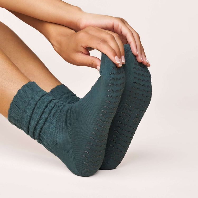Scrunch Grip Socks - Teal close-up showing the non-slip soles and soft cotton material.